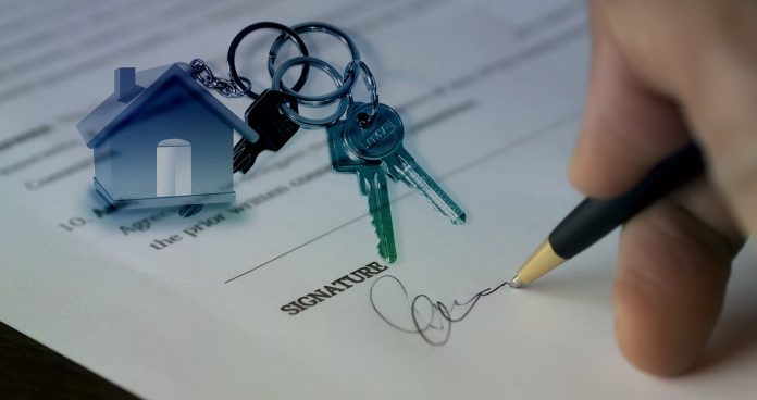 A person signing a pirchase contract finding something appropriate in accordance with the North Carolina real estate trends.