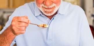 A health old man eating fresh fruits